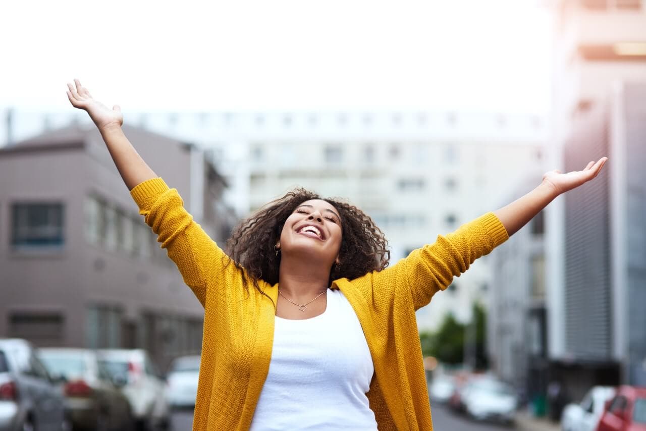Smiling vacation rental host — list your property on My Time to Explore